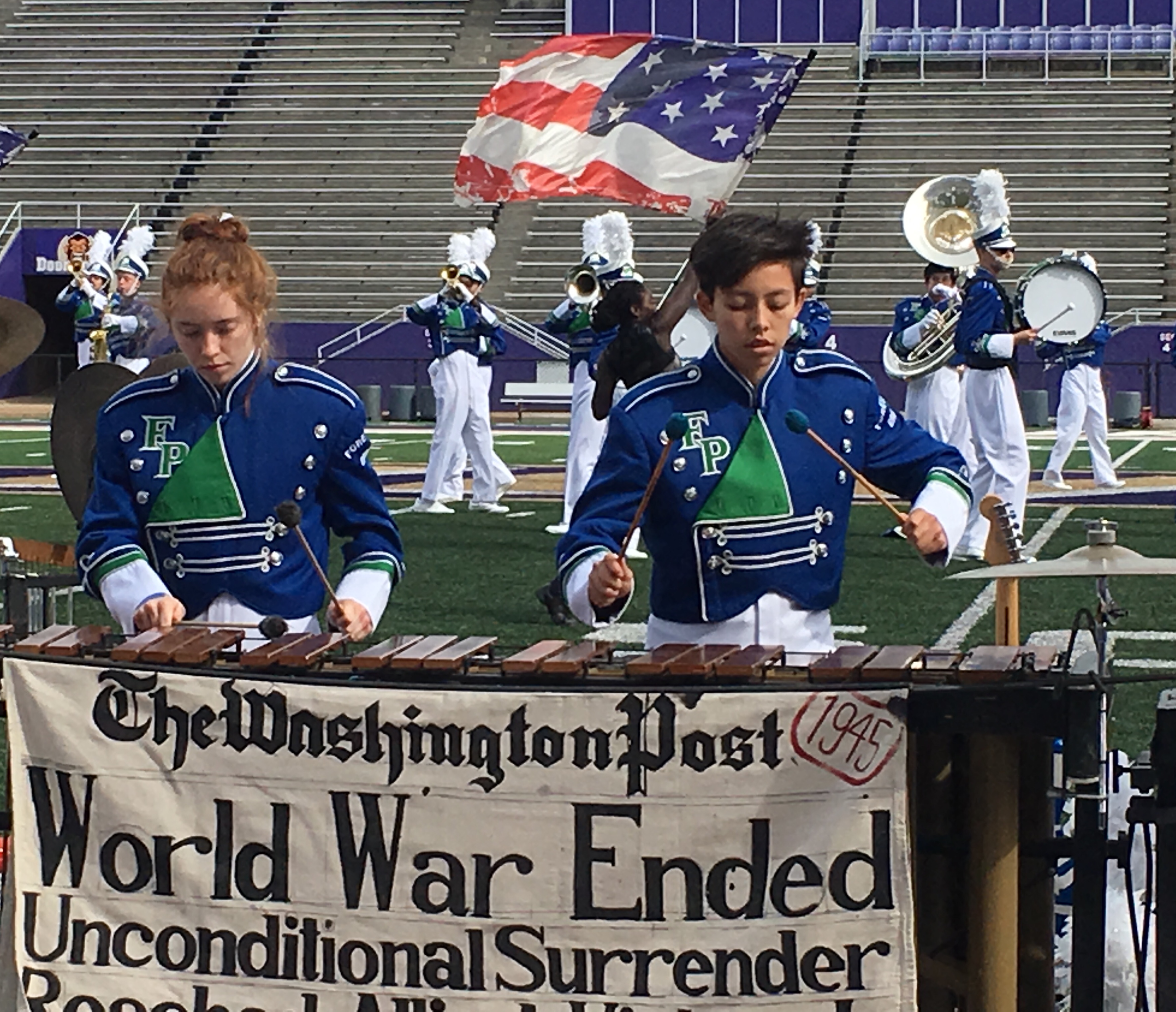 The newspaper headlines displayed on the center marimba. I'm playing the lower register
