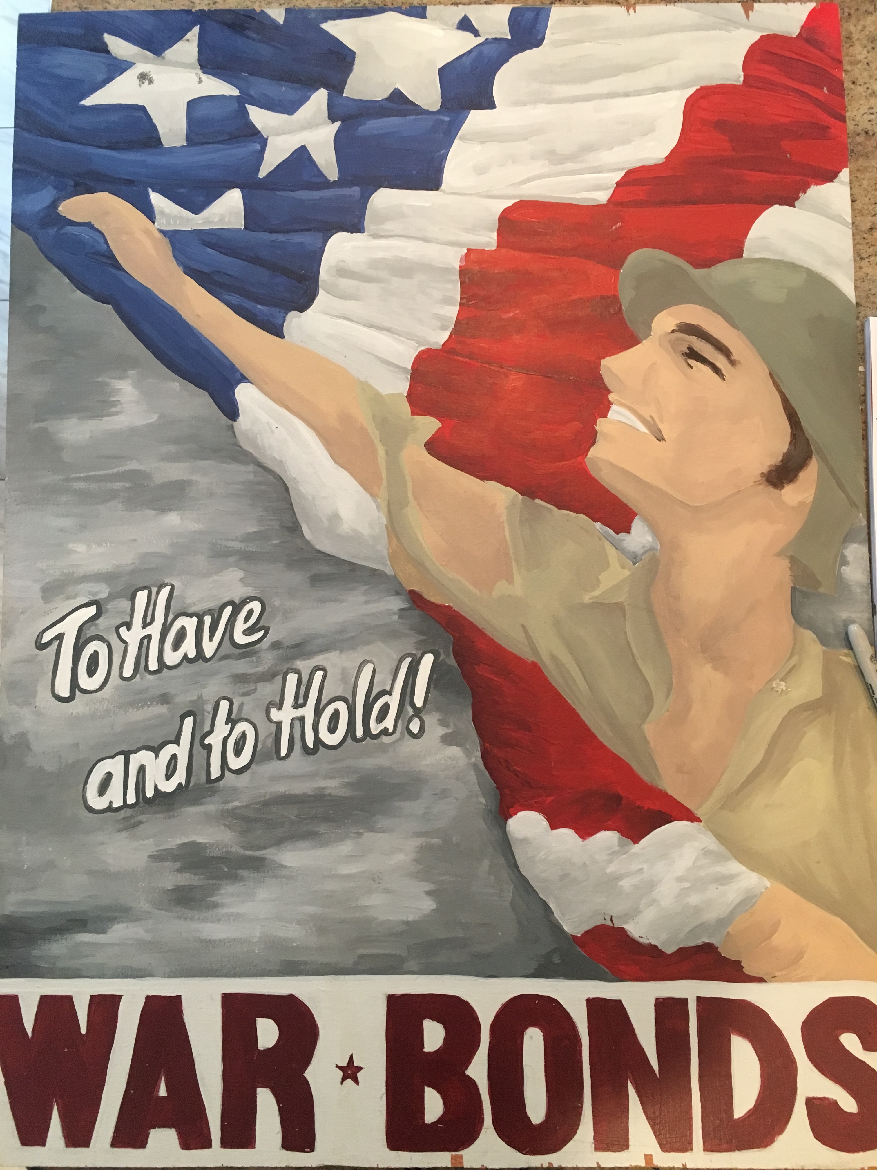 Painted replica of a WWII American propaganda poster