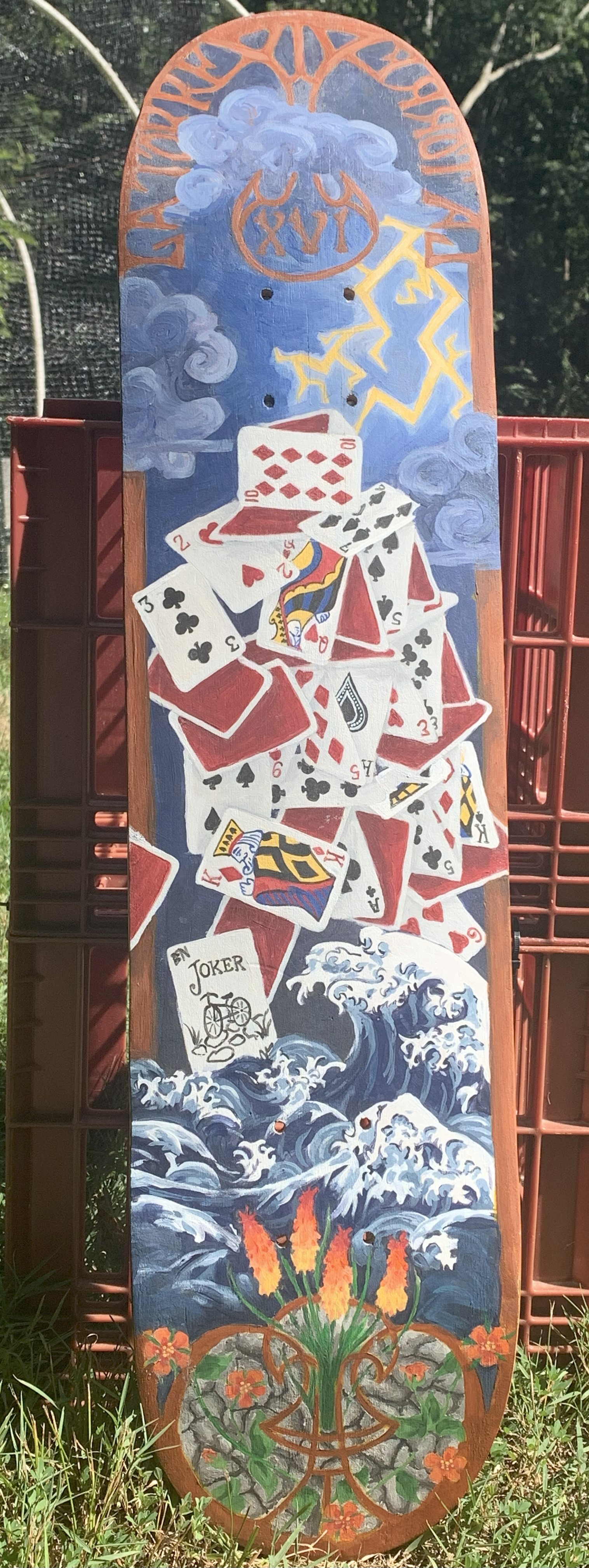 Skateboard, painted with symbolic imagery heavily inspired by Tarot